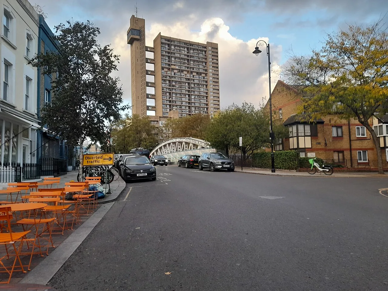Golborne Road, North Kensington, with Trellick Tower behind; the charity is based on this street